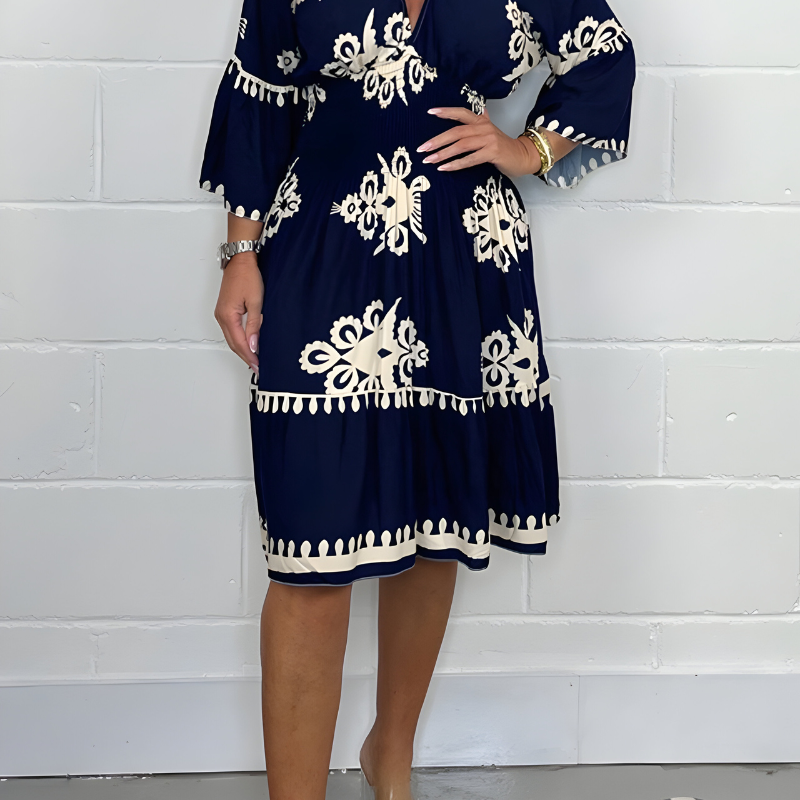 Robe élégante à motifs avec col en V – parfaite pour toutes les occasions