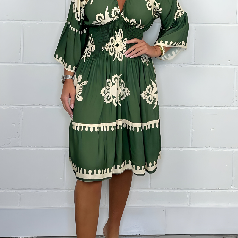 Robe élégante à motifs avec col en V – parfaite pour toutes les occasions