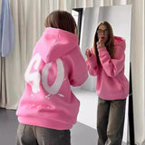 Oversized Hoodie mit abstraktem Rückendruck – Urban, Cozy & Ausdrucksstark