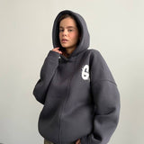 Oversized Hoodie mit abstraktem Rückendruck – Urban, Cozy & Ausdrucksstark