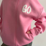 Oversized Hoodie mit abstraktem Rückendruck – Urban, Cozy & Ausdrucksstark