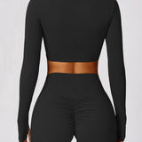 Livia – Langarm Crop-Top mit Twist