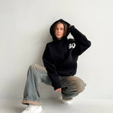 Oversized Hoodie mit abstraktem Rückendruck – Urban, Cozy & Ausdrucksstark