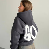 Oversized Hoodie mit abstraktem Rückendruck – Urban, Cozy & Ausdrucksstark