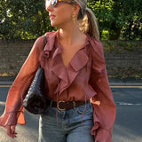 Femora - Transparente Volantbluse