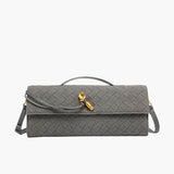 Finja - Clutch aus Kunstleder geflochten